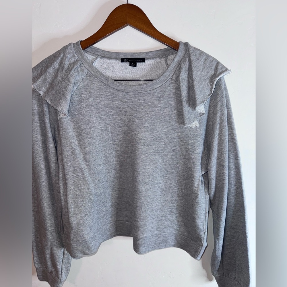 Ruffle shoulder sweatshirt